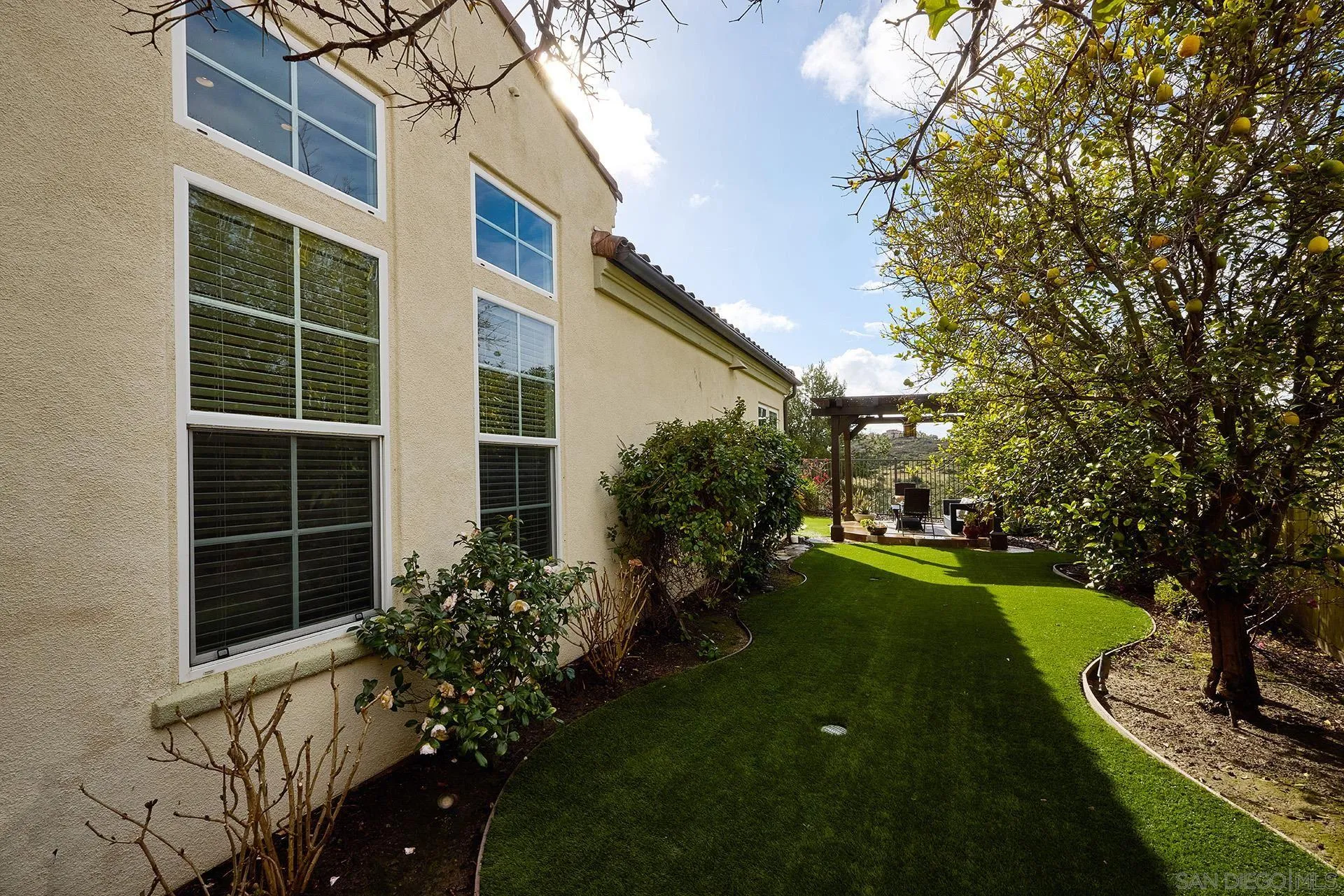 6615 Halite Place Carlsbad, CA 92009 - Photo 36 of 56 a view of a house with backyard and garden