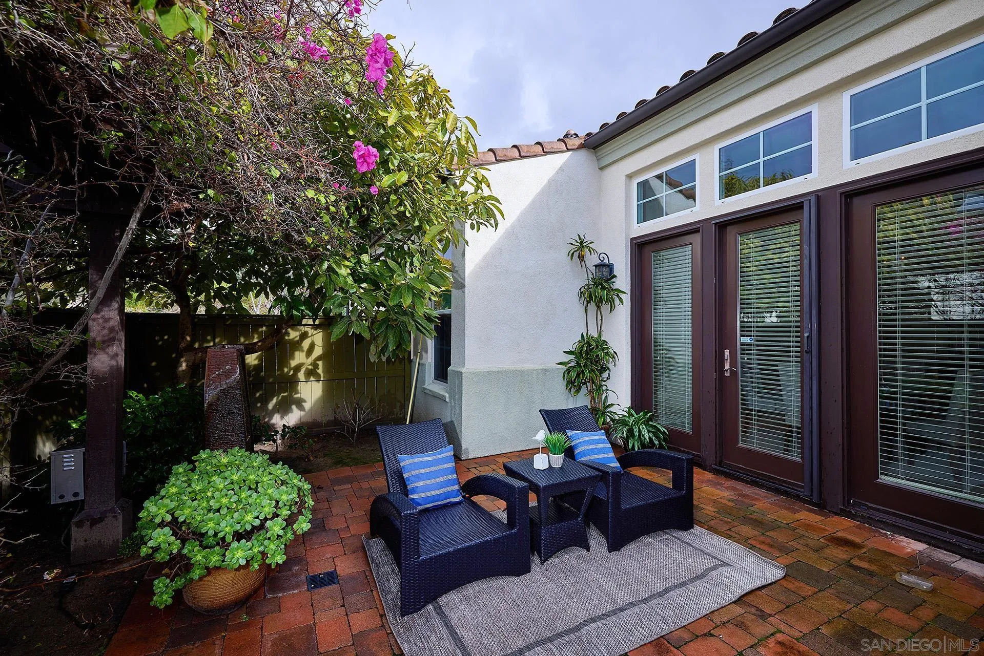 6615 Halite Place Carlsbad, CA 92009 - Photo 37 of 56 a backyard of a house with outdoor seating