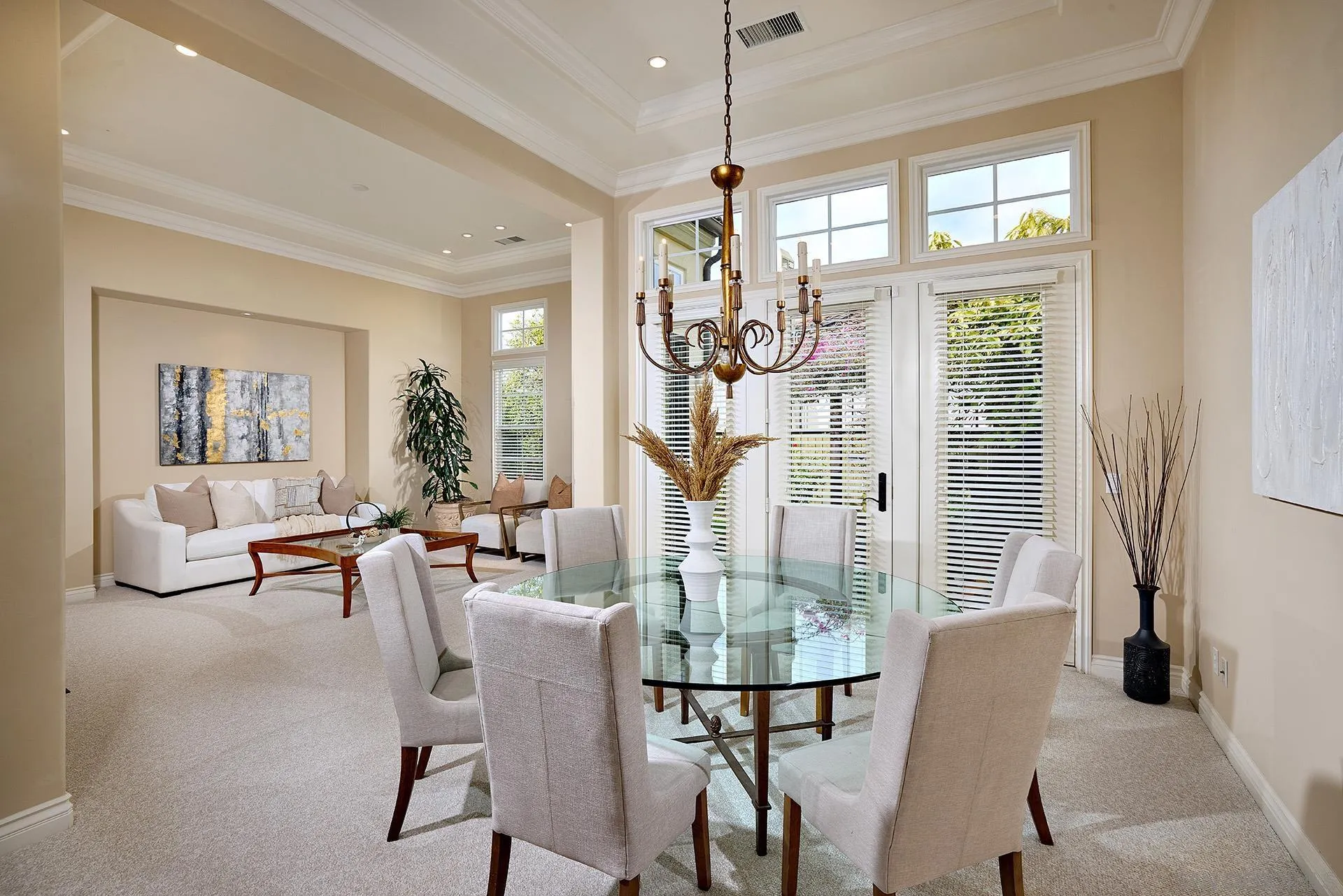 6615 Halite Place Carlsbad, CA 92009 - Photo 6 of 56 a living room with furniture a chandelier and a large window