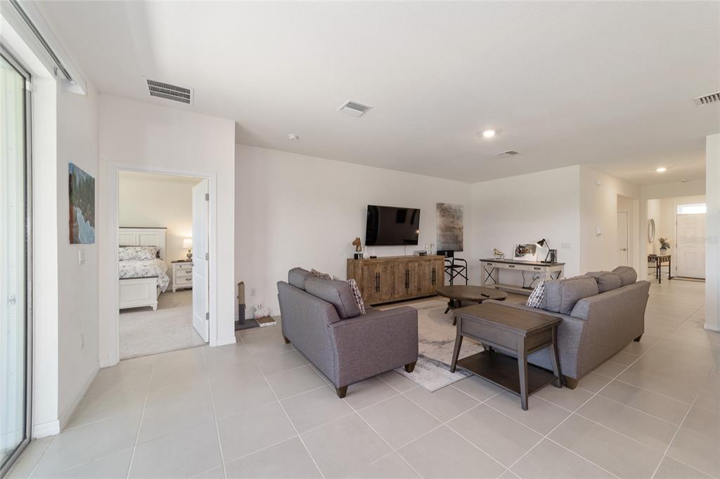 5252 Northwest 46th Lane Road Ocala, FL 34482 - Photo 11 of 51 a living room with furniture and a view of kitchen