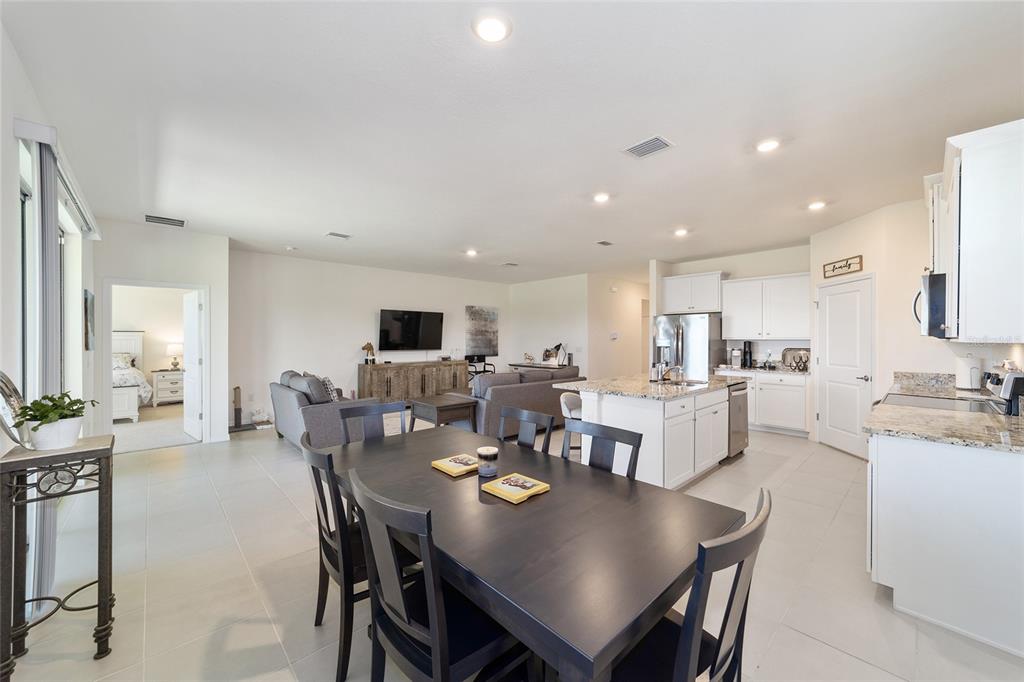 5252 Northwest 46th Lane Road Ocala, FL 34482 - Photo 23 of 51 a view of a dining area with furniture