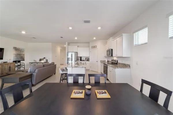 a view of a dining room with furniture
