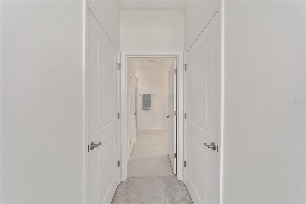 5252 Northwest 46th Lane Road Ocala, FL 34482 - Photo 31 of 51 a view of a bathroom from a hallway