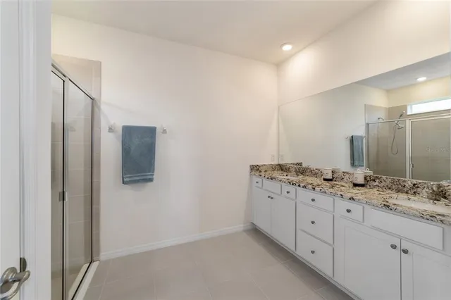 a bedroom with a bed and dresser