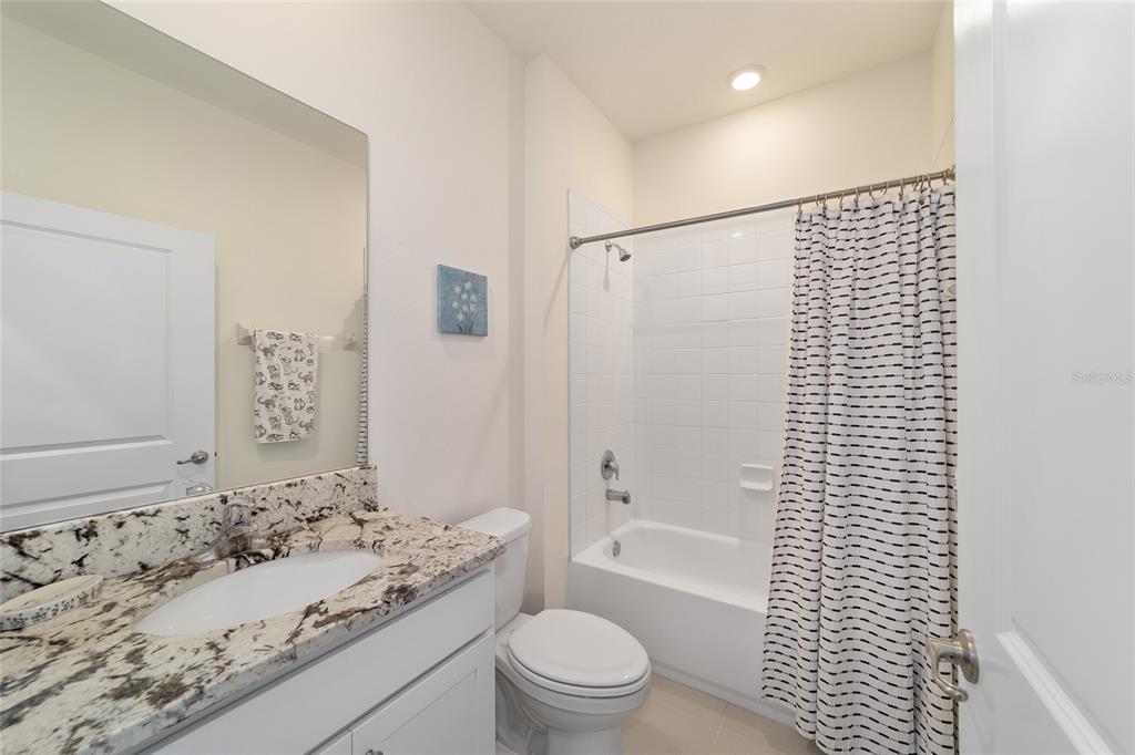 5252 Northwest 46th Lane Road Ocala, FL 34482 - Photo 37 of 51 a bathroom with a sink toilet and shower