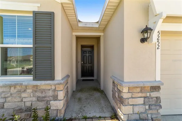 a front view of a house with a shower