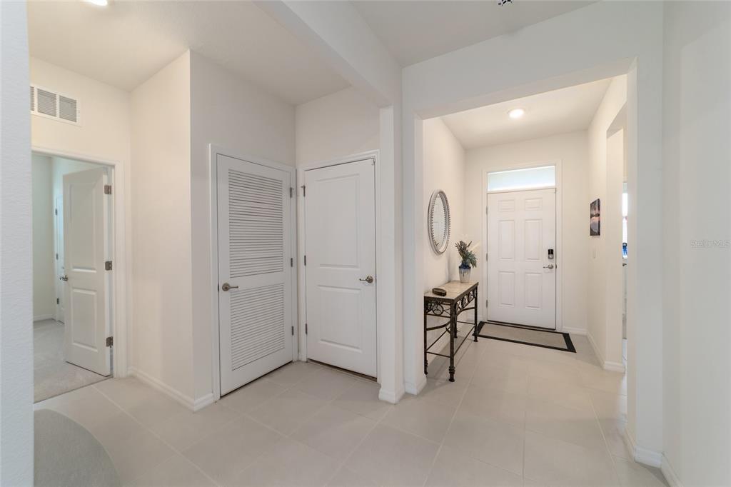 5252 Northwest 46th Lane Road Ocala, FL 34482 - Photo 6 of 51 a view of a livingroom with furniture and front door