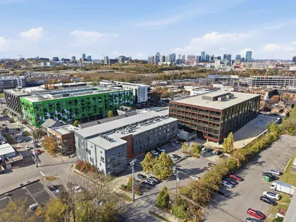 a view of a house with a door and a chair