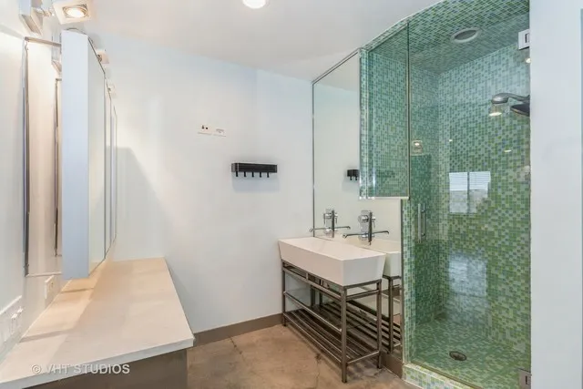 a view of a hallway and wooden floor