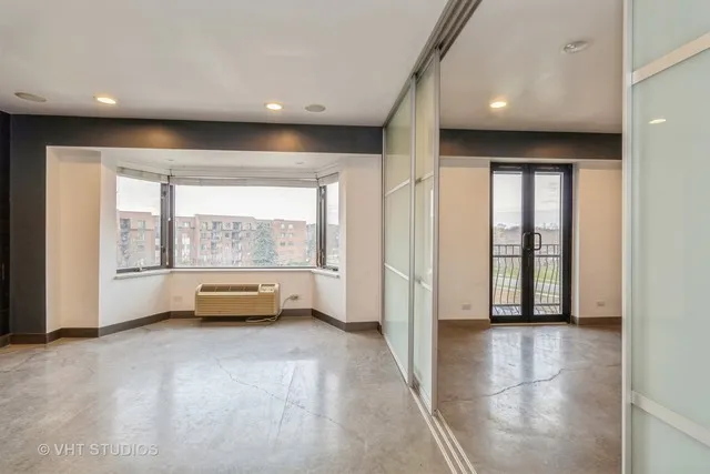 an empty room with windows