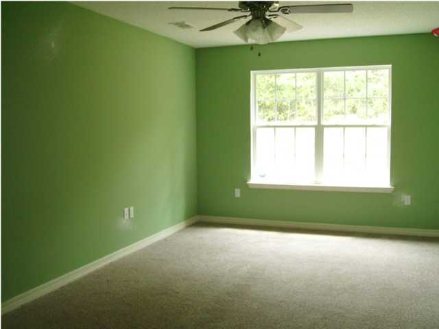 311 Dahlquist Drive Crestview, FL 32539 - Photo 7 of 14 a room with a window and a fan