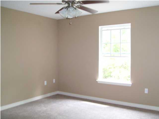 311 Dahlquist Drive Crestview, FL 32539 - Photo 9 of 14 an empty room with a window