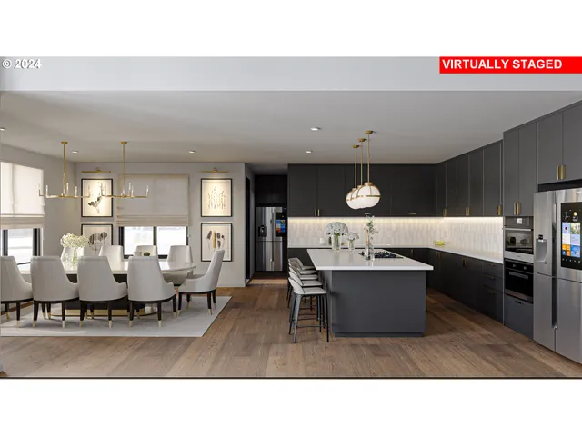 a living room with furniture a table and kitchen view