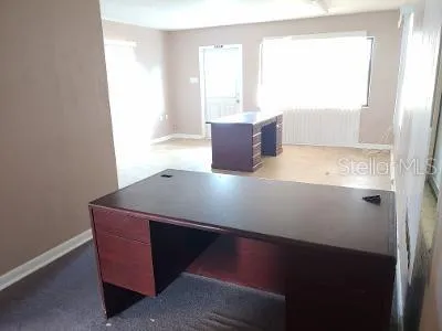 a room with furniture and window