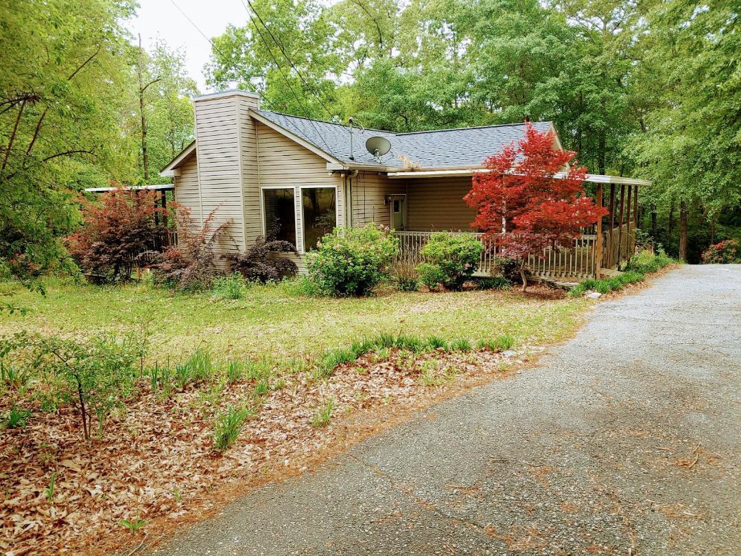 7531 Goodall Mill Road Macon, GA 31216 - Photo 14 of 16 a front view of house with yard and green space