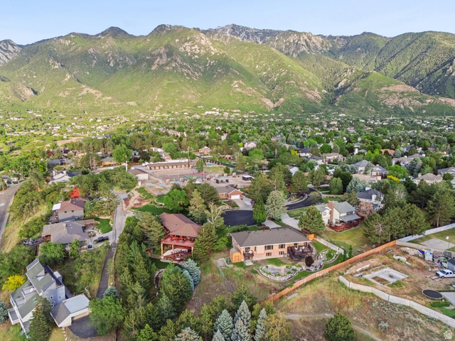 2342 Charros Road Sandy, UT 84092 - Photo 81 of 94 Expansive aerial perspective showcasing a residential area with a prominent mountainous backdrop
