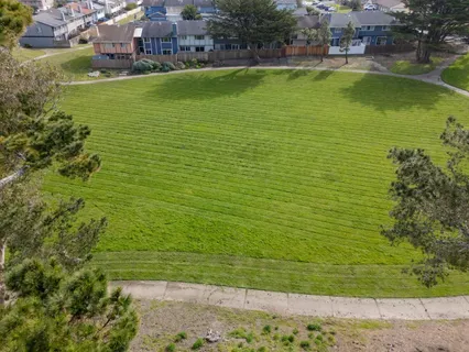 a view of an ocean house and a yard