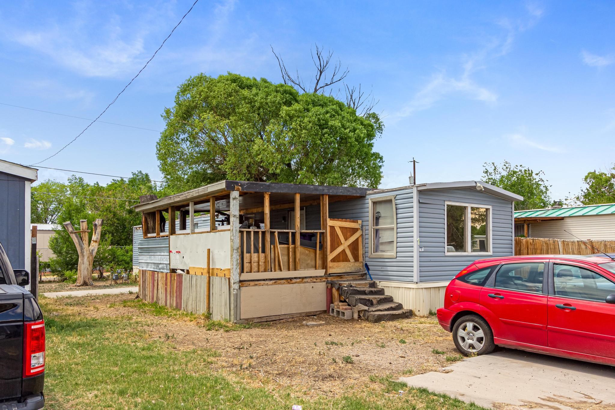 3268 E Road, Unit 1 Clifton, CO 81520 - Photo 1 of 17 a view of a house with a patio