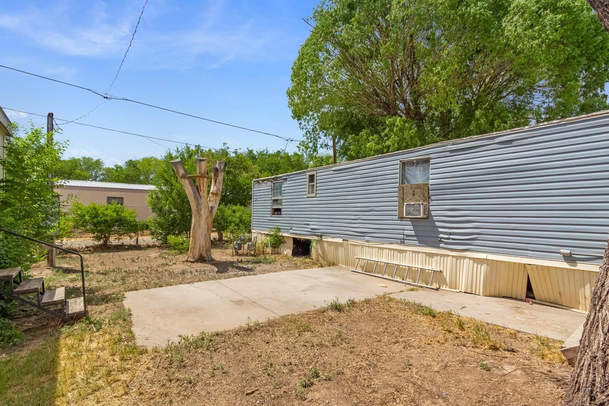 3268 E Road, Unit 1 Clifton, CO 81520 - Photo 4 of 17 a view of a backyard with a patio