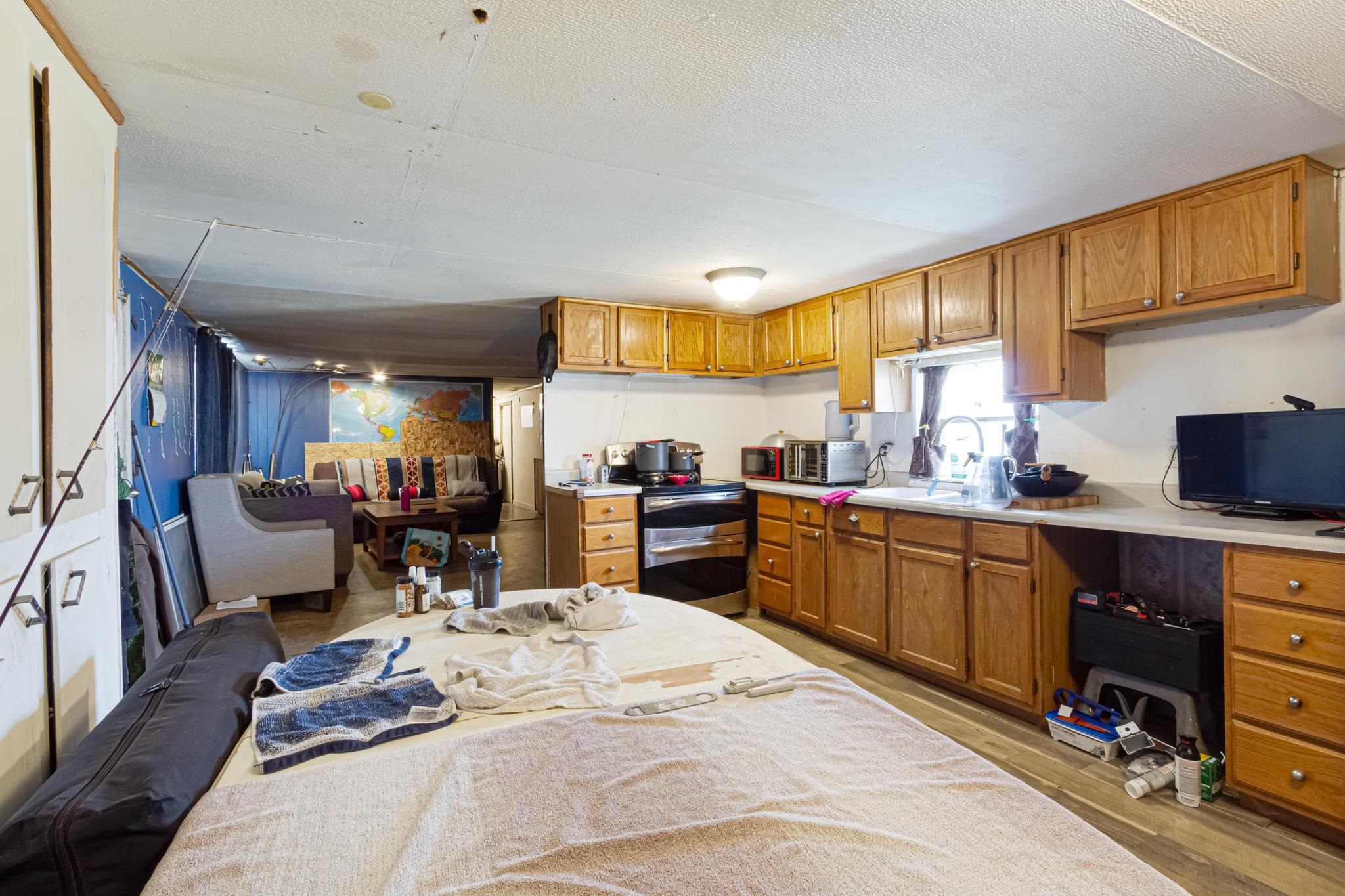 3268 E Road, Unit 1 Clifton, CO 81520 - Photo 8 of 17 a kitchen with a sink appliances and cabinets
