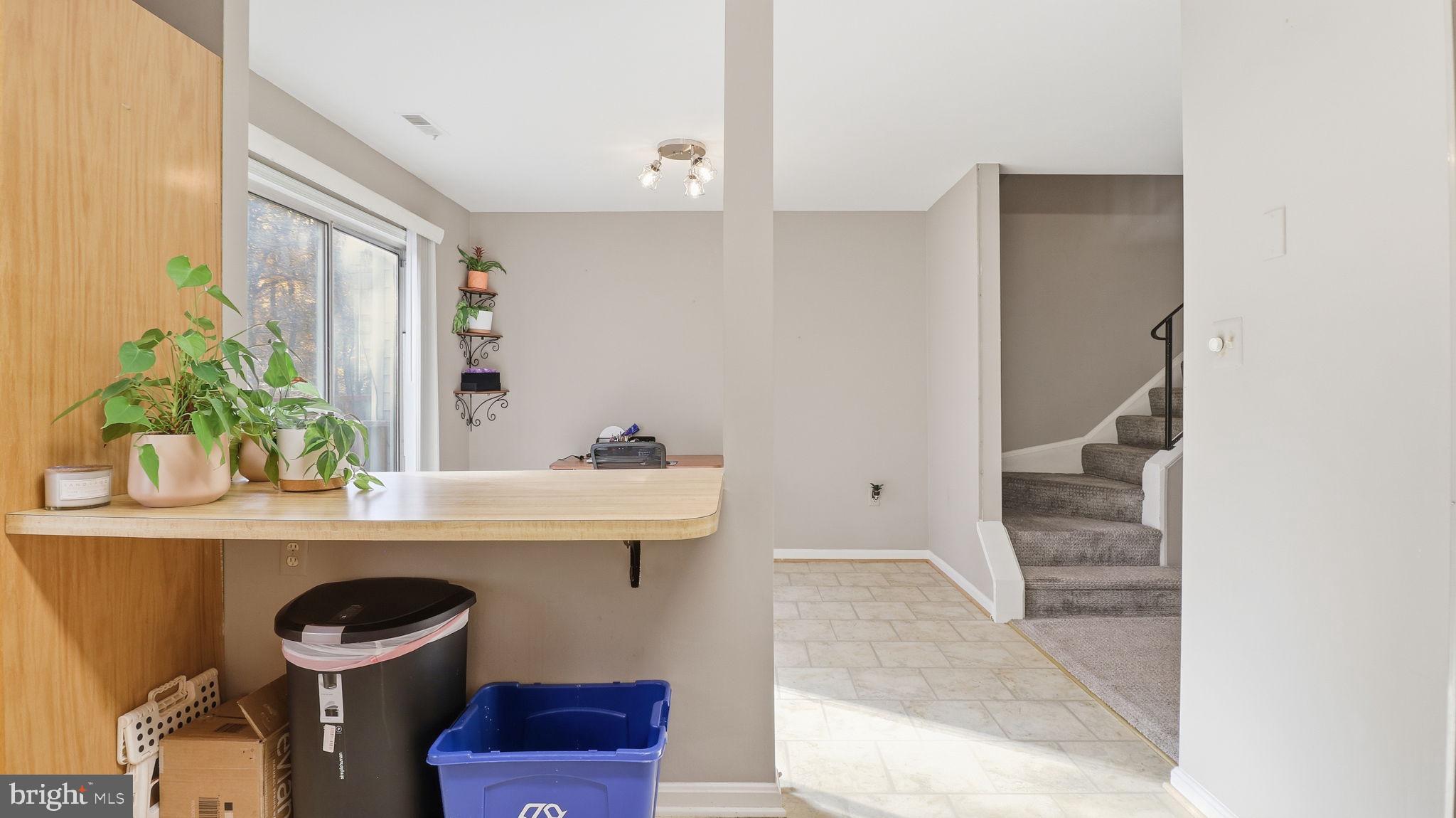 7631 South Arbory Lane, Unit 360 Laurel, MD 20707 - Photo 12 of 25 a bathroom with a sink a toilet and mirror