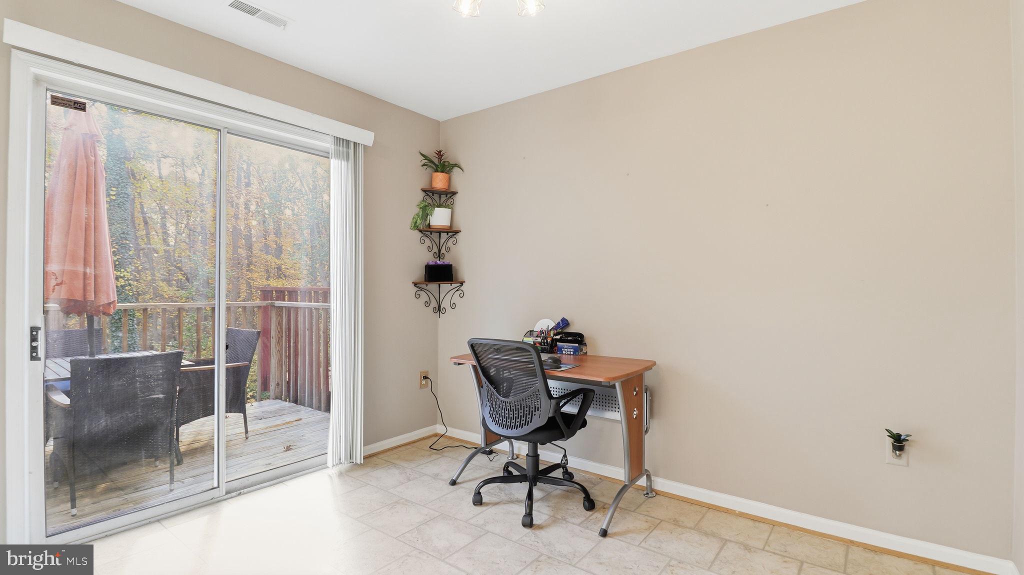 7631 South Arbory Lane, Unit 360 Laurel, MD 20707 - Photo 13 of 25 a workspace with furniture and a window