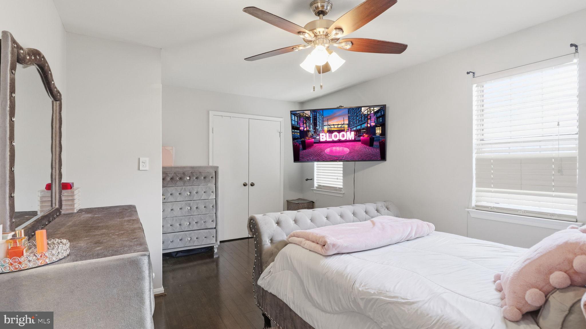 7631 South Arbory Lane, Unit 360 Laurel, MD 20707 - Photo 14 of 25 a bedroom with a bed dresser and a window