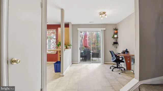 a view of a livingroom with natural light