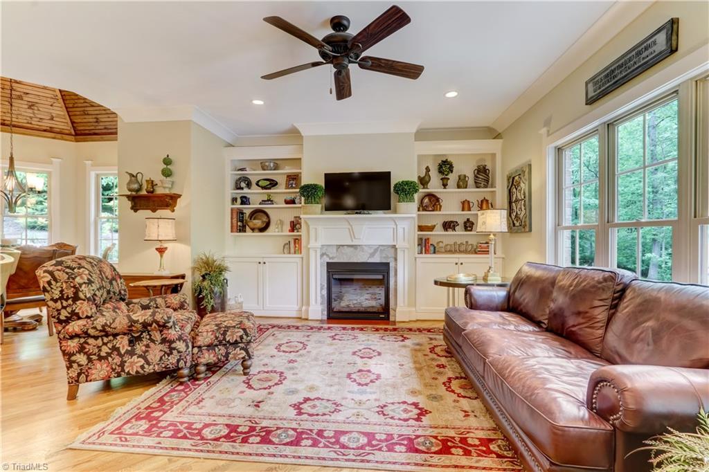 5807 Bison Drive Oak Ridge, NC 27310 - Photo 16 of 39 Here is where you will hang out! The keeping room with built ins is the perfect place for relaxing.