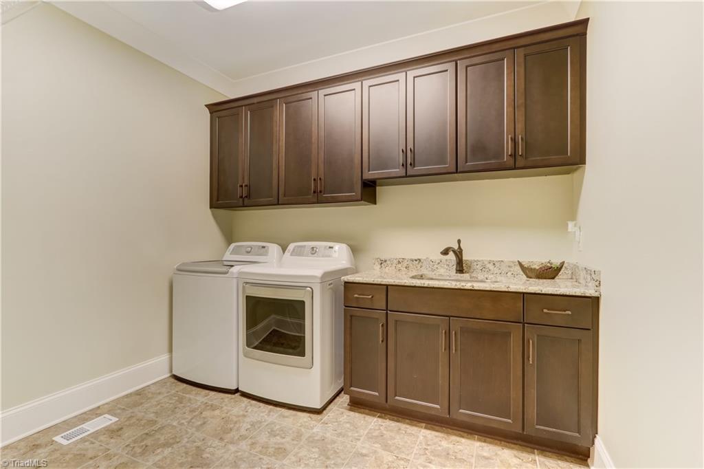 5807 Bison Drive Oak Ridge, NC 27310 - Photo 21 of 39 Rooms in this home are oversized including the laundry!!
