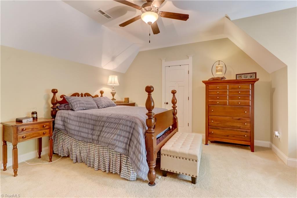 5807 Bison Drive Oak Ridge, NC 27310 - Photo 23 of 39 Another bedroom. All with walk in closets.