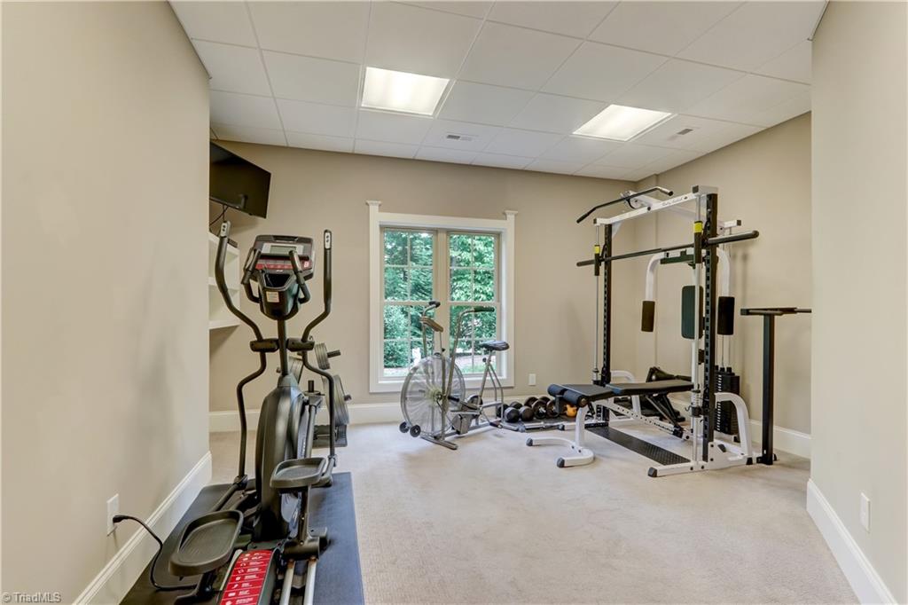 5807 Bison Drive Oak Ridge, NC 27310 - Photo 30 of 39 Additional room currently used as a gym in lower level.