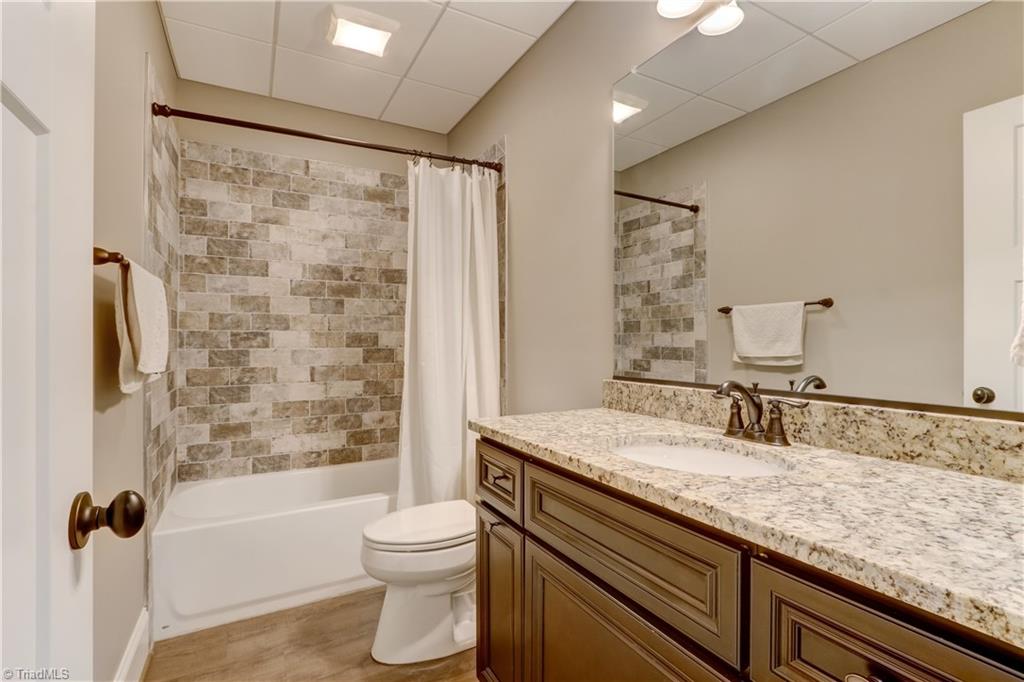 5807 Bison Drive Oak Ridge, NC 27310 - Photo 32 of 39 Full bath on lower level. No skimping on quality here!