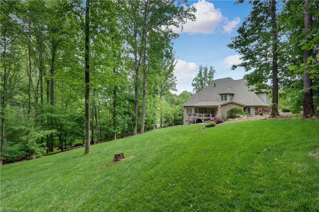 5807 Bison Drive Oak Ridge, NC 27310 - Photo 36 of 39 Rear of home.