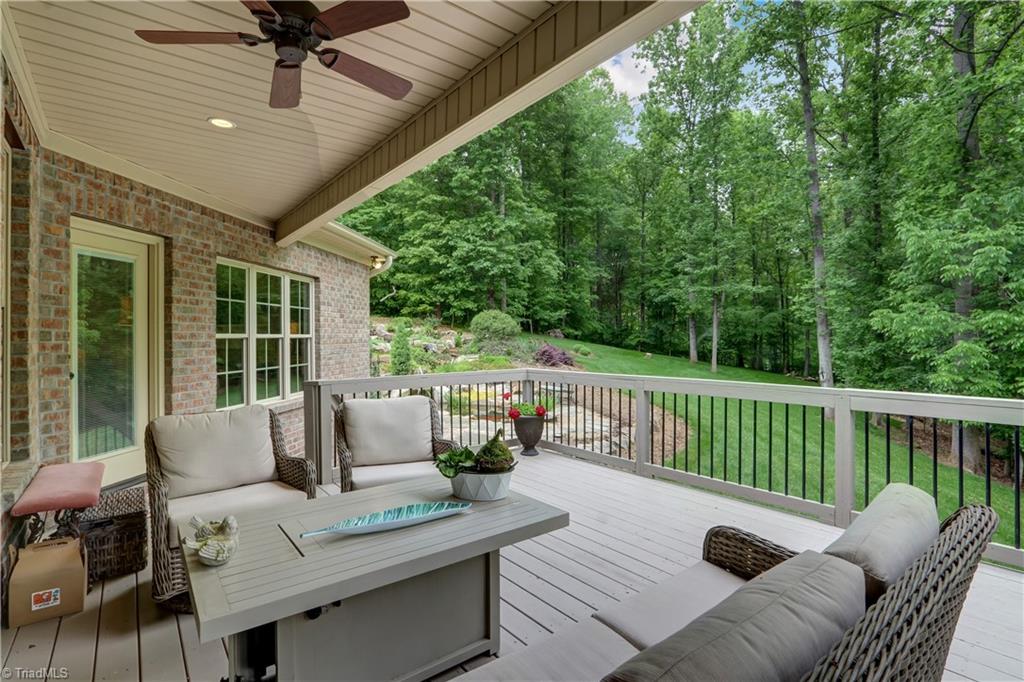 5807 Bison Drive Oak Ridge, NC 27310 - Photo 5 of 39 Covered Rear Porch with entrance into kitchen/breakfast area.