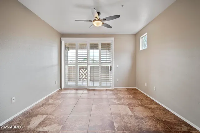 a kitchen with stainless steel appliances granite countertop a refrigerator a stove and a sink