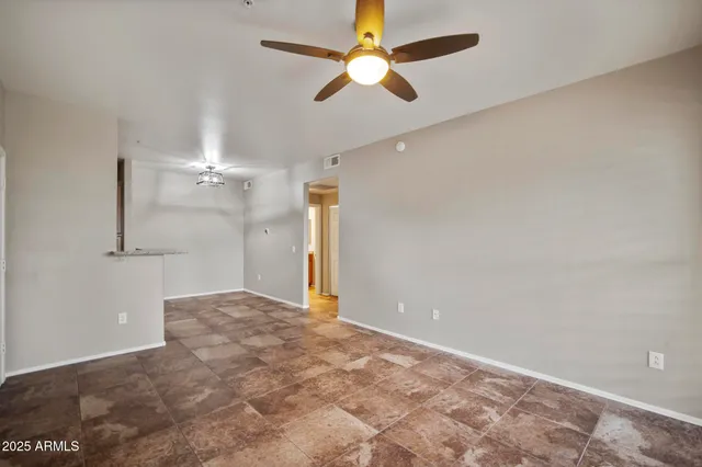 a view of storage and utility room with empty racks