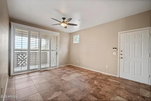 a view of an empty room and window