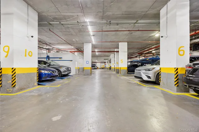 a bathroom with a double vanity sink toilet and shower