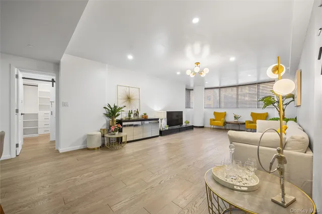 a kitchen with a sink stainless steel appliances and cabinets