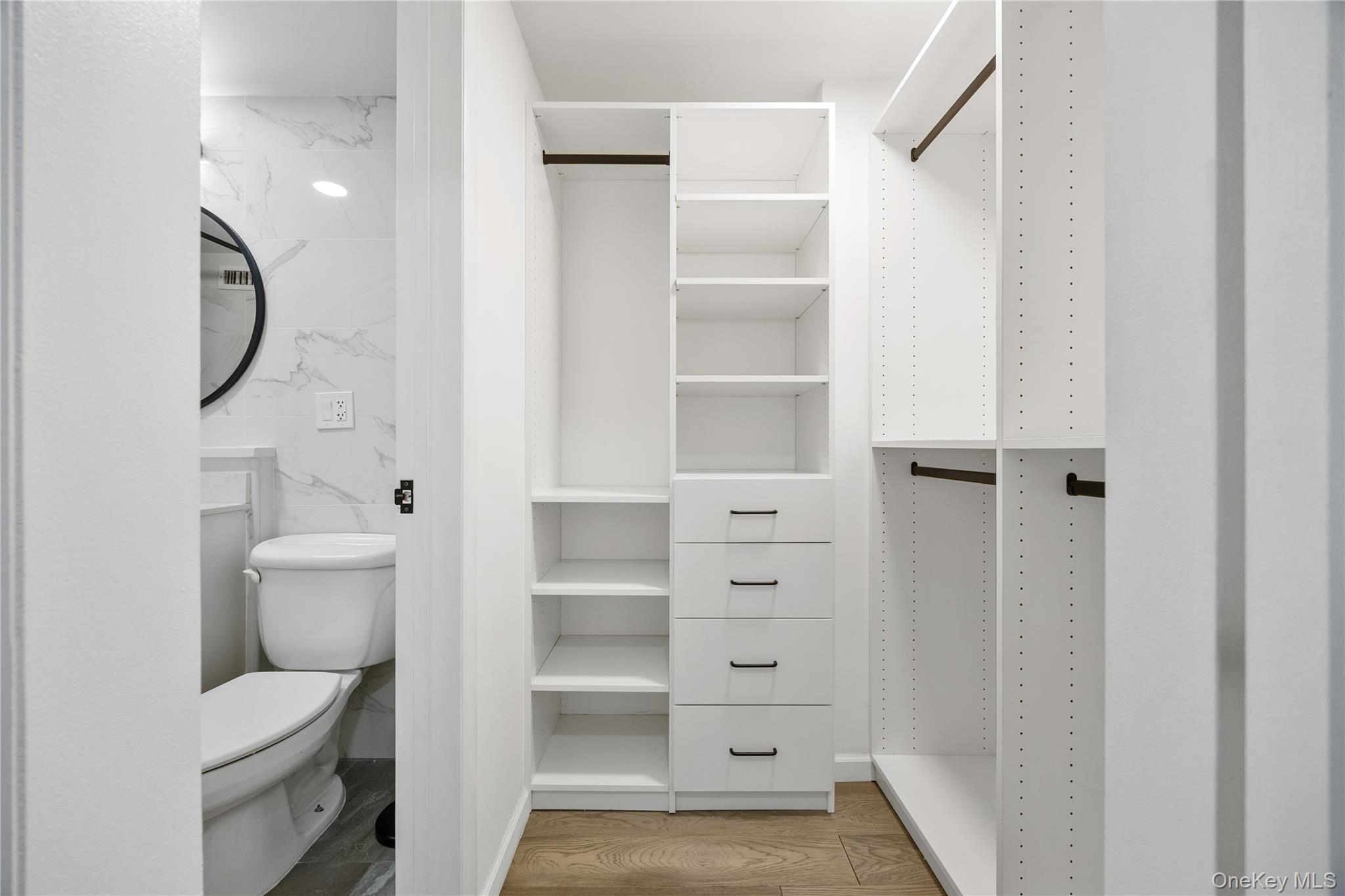 133-38 Sanford Avenue, Unit 6C Queens, NY 11355 - Photo 7 of 21 a view of bathroom with toilet