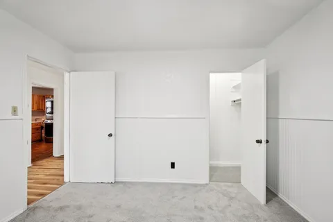 an empty room with an entryway