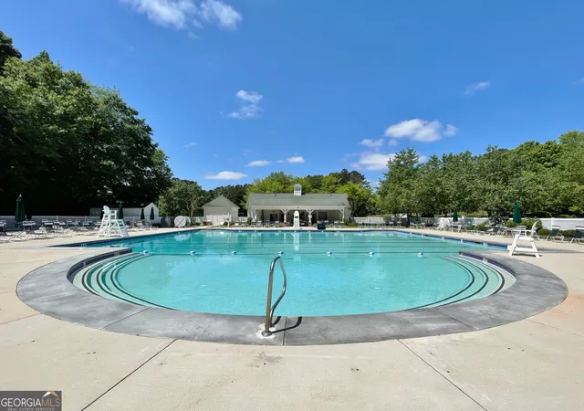 a view of street with palm trees