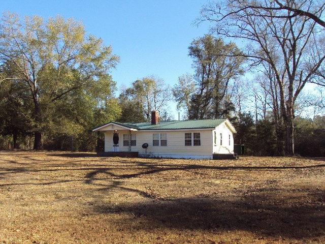 2068 Shockley Springs Road Baker, FL 32531 - Photo 2 of 5 a front view of a house with a yard