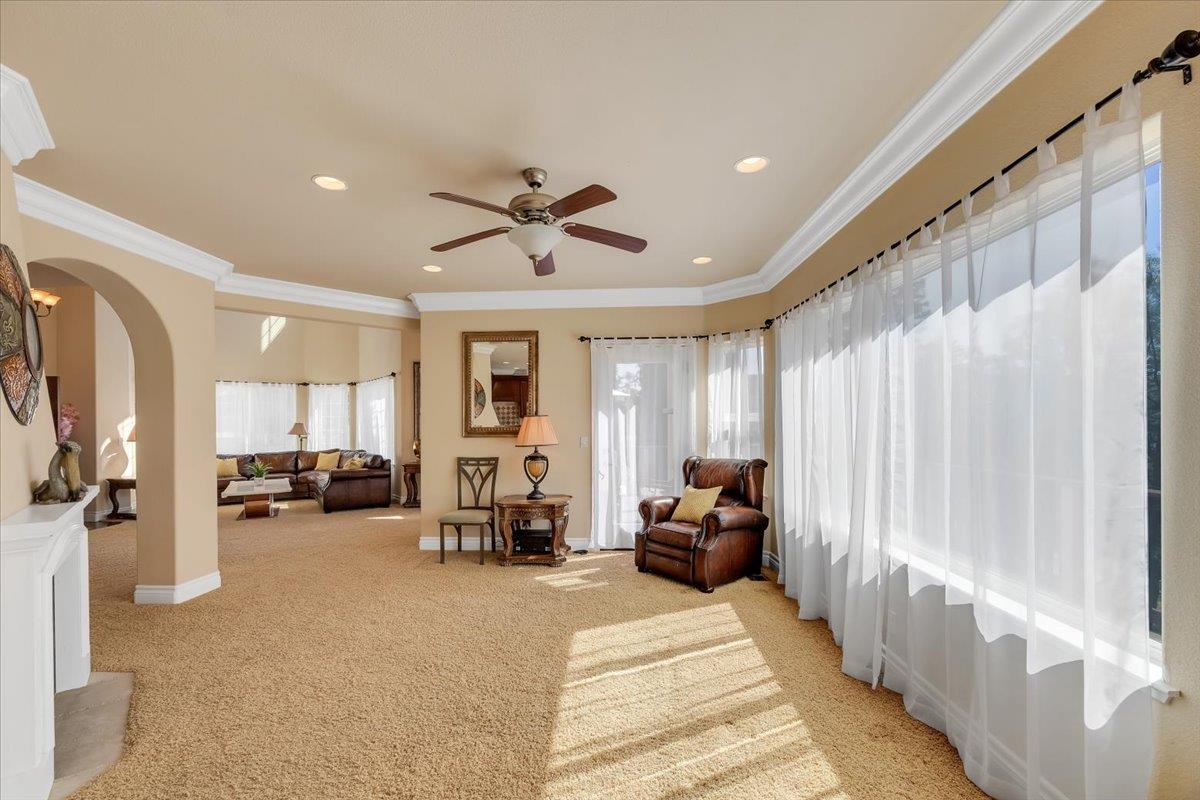 294 Sunrise Road, Unit 2 Copperopolis, CA 95228 - Photo 20 of 98 a view of a livingroom with furniture and a ceiling fan
