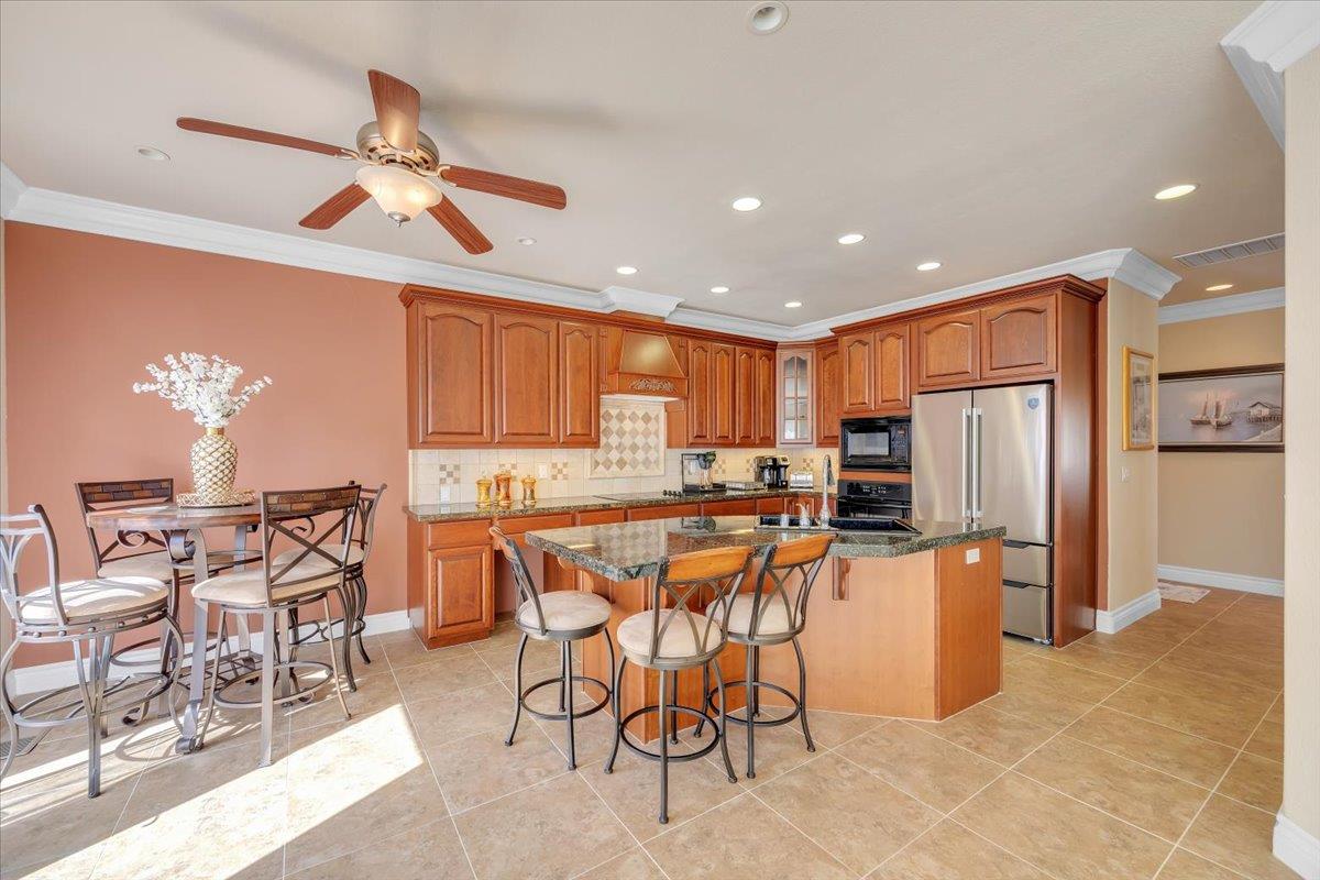 294 Sunrise Road, Unit 2 Copperopolis, CA 95228 - Photo 22 of 98 Large eat-in bar plus dining nook and formal dining around the corner.