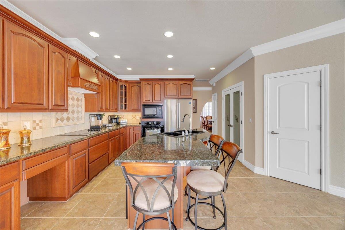 294 Sunrise Road, Unit 2 Copperopolis, CA 95228 - Photo 23 of 98 Large pantry closet and built-in desk area.