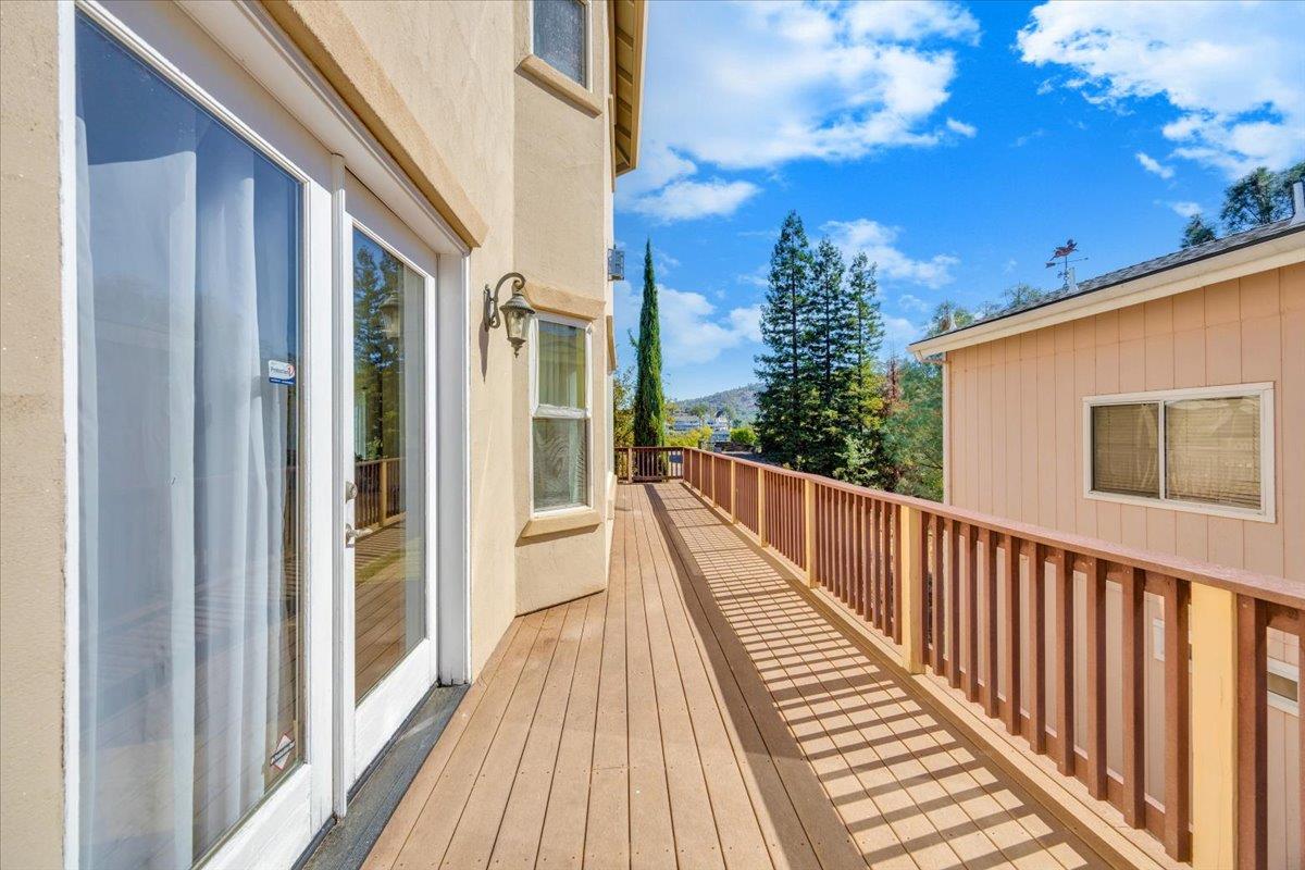 294 Sunrise Road, Unit 2 Copperopolis, CA 95228 - Photo 33 of 98 a view of a balcony with wooden floor