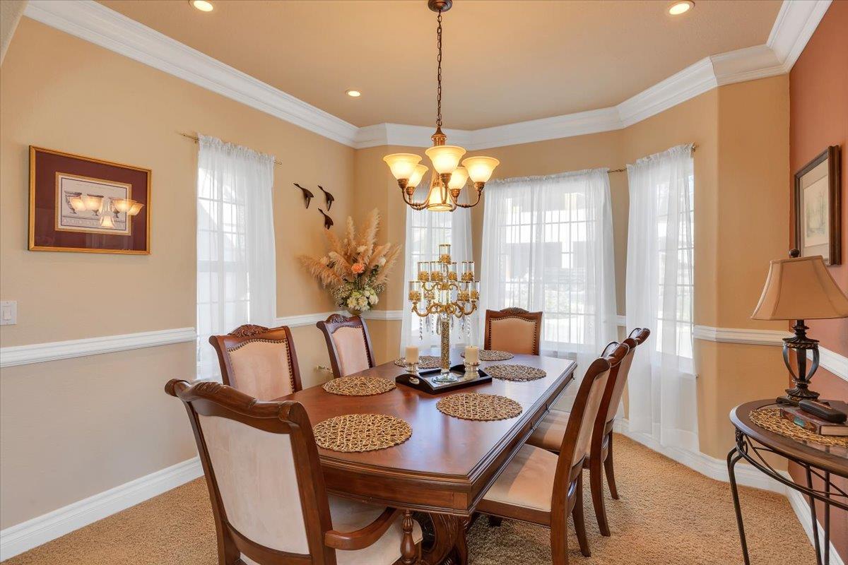 294 Sunrise Road, Unit 2 Copperopolis, CA 95228 - Photo 38 of 98 a view of a dining room with furniture window and outside view