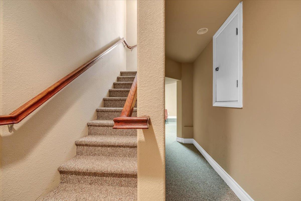 294 Sunrise Road, Unit 2 Copperopolis, CA 95228 - Photo 44 of 98 a view of staircase with white walls and windows